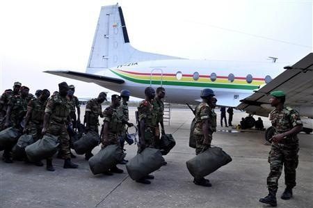 
Benin soldiers stand in preparation to leave for their deployment to Mali, in the capital Cotonou January 18, 2013. The contingent of around 30 Benin troops will leave Cotonou for the Mali capital Bamako.Credit: Reuters/Charles Placide

