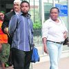 Jermour Noel leaves the Port of Spain Magistrates’ Court yesterday after he was granted $80,000 bail on a charge of biting the face and leg of his five-day-old daughter.