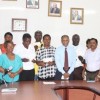 Minister Leslie Ramsammy (at centre with necktie) poses with the groups and officials of his ministry and IPED. (Ministry of Agriculture photo)