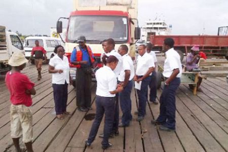 MARAD official Michael Tennant briefing cadets at Parika before the commencement of the safety campaign yesterday. (GINA photo)