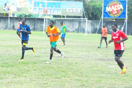Footballers of the Alpha United Football Club going through their paces during Thursday’s practice session at the Georgetown Football Club (GFC) ground. (Orlando Charles photo)