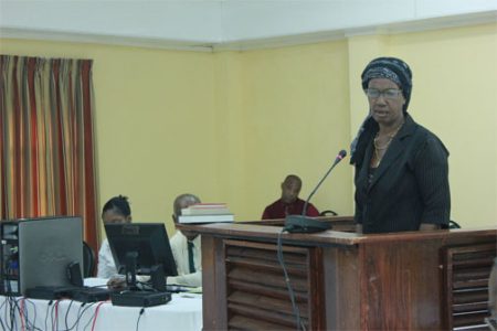 Margaret Somerset during her testimony yesterday before the Commission of Inquiry into the death of her son and the wounding of others at Linden last year( photo by Arian Browne)