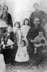Loo Shee sitting at left and her husband Prince Chung, sitting right, with two of her children and grandchildren just before she returned to China in 1904.