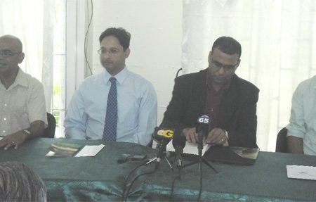 Sitting from left are Dr David Singh of Conservation International-Guyana, Anand Beharry, Executive of the Beharry Group of Companies, Minister Robert Persaud and Damian Fernandes, Commissioner of the Protected Areas Commission.  