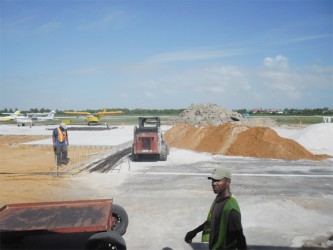  Work being done on a section of the runway at the Ogle International Airport. 