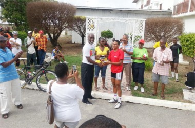 Alonzo Greaves receives his award from executive member of the Burnham Foundation Vincent Alexander.  