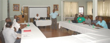 GBOC president Cecil Chin makes a point Saturday at Saturday’s Referees seminar held at Duke Lodge.   