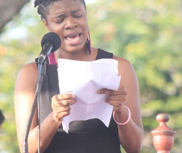 Actress Lloyda Nicholas-Garrett performs Eve Ensler’s monologue “Rising” at the Guyana event at the Promenade Gardens yesterday. (Photo by Arian Browne)
