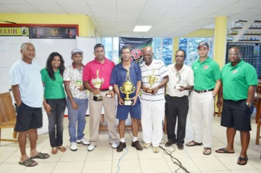 The winners, sponsors representatives and officials of Lusignan Golf Club during the presentation for Stag Beer Mashramani tournament.