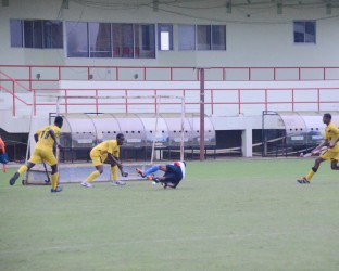 GCC’s Orlando Semple scores against Hikers Cadets in the men’s final of the Bounty One-Day Hockey tournament at the Guyana National Stadium. 