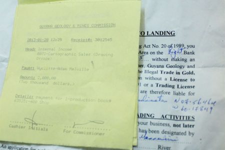 A copy of a receipt as well as a document handed out by the GGMC giving permission for operations to be carried out in the area.