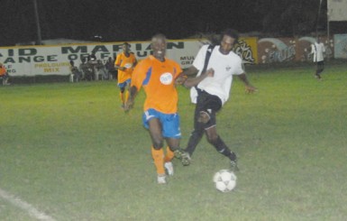 Action between Santos in white and Conquerors in orange 