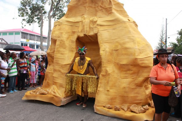 All gold everything: A gold nugget part of the Ministry of Natural Resources and the Environment costume band during yesterday’s Annual Mashramani Costume and Float Parade. (Photo by Arian Browne)