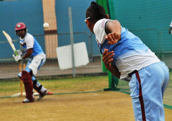  Sunil Narine bowling to Guyana’s Ramnaresh Sarwan in the nets yesterday. (Photo courtesy of WICB media)