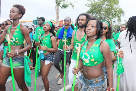 Mobile money: GT&T went green on Saturday as it launched its new Mobile Money service during the Annual Mashramani Costume and Float Parade. (Photo by Arian Browne)