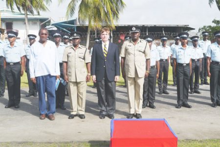 Felix Austin graduates: Posing with some of the graduates from right to left are: Commander of ‘B’ Division, Bryan Joseph; US Ambassador, D. Brent Hardt; Deputy Commander, Clifton Hicken and chairman of the management committee of the college, Alex Foster.