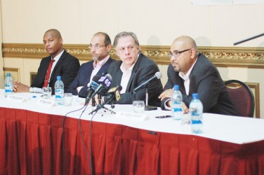 Executive Director of CGX Energy Inc.  Professor Suresh Narine (extreme right) responding to questions at CGX’s press conference yesterday. Also at the table from left to right are President of the Georgetown Chamber of Commerce and Industry Clinton Urling; Serafino Iacono, Chairman of Pacific Rubiales and Ronald Pantin, CEO of Pacific Rubiales. 