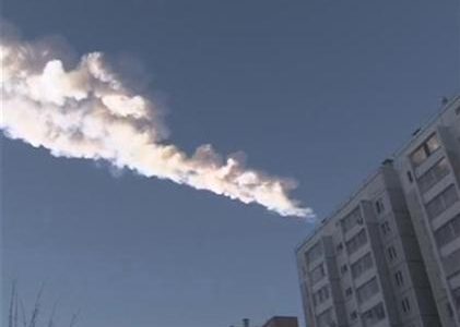 The trail of a falling object is seen above a residential apartment block in the Urals city of Chelyabinsk, in this still image taken from video shot on February 15, 2013.Credit: Reuters/OOO Spetszakaz