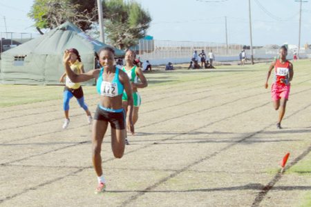 FLASHBACK! Alita Moore wins the female U20, 100m at the CARIFTA Games Trials last Saturday.