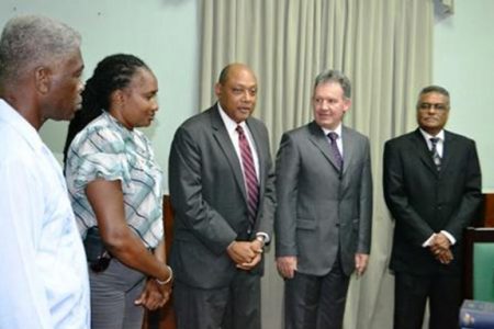 Speaker of the House, Raphael Trotman (centre) delivering remarks at the handing over by British High Commis-sioner Andrew Ayre (second from right). Also in photo from right are Members of Parliament Manzoor Nadir, Annette Ferguson and Richard Allen. (GINA photo)