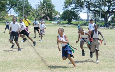 Action during North Georgetown Secondary School ‘A’ Team’s victory over Covent Garden yesterday at the National Park Rugby field. (Orlando Charles photo) 