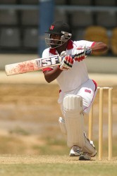 Adrian Barath pushes one through the offside during his half century. WICB Media Photo/Ashley Allen