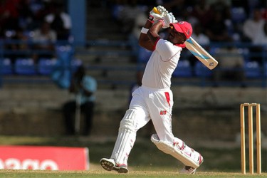 DM Bravo hits a six out of the Queens Park Oval WICB Media Photo/ Ashley Allen