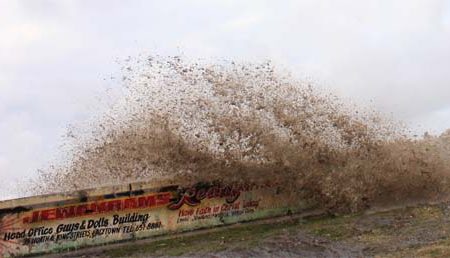 Waves splash over the seawall during high tides in January this year (Stabroek News file photo/Arian Browne)