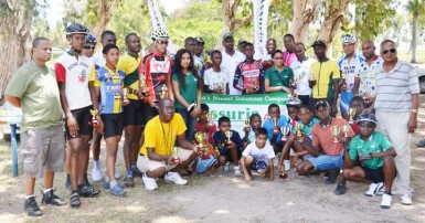 Winners and runners-up of the inaugural Assuria Insurance Company cycle programme pose with their spoils upon completion of yesterday’s event. 
