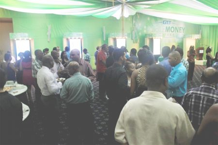 Part of the gathering at the Pegasus Hotel last evening for the launch of GT&T’s ‘Mobile Money’ service.
