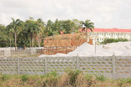 A wooden building going up at the specialty hospital site yesterday (Photo by Arian Browne)
