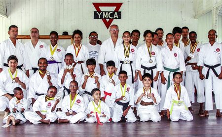 The YMCA Karate Mashramani winners and other participants.