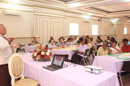 Director of Children Services Ann Greene addressing administrators from the
country’s 23 children’s homes at a workshop at the Regency Hotel yesterday. (Arian Browne photograph)