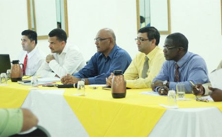 The GPL delegation, including CEO Bharat Dindyal (second from left),  Director for Loss Reduction Kumar Sharma (extreme left),  Senior Division Director of Information Technology Renford Homer (first from right) and Elwin Marshall, Divisional Director of Operations (extreme right). (Photo by Arian Browne)