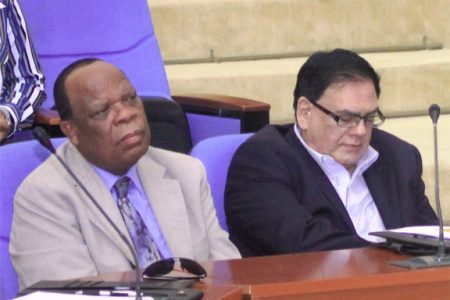 Trevor Hamilton of Trevor Hamilton and Associates alongside UG Pro-Chancellor Prem Misir during the opening session of the workshop held yesterday to discuss his findings on the University of Guyana. (Arian Browne)
