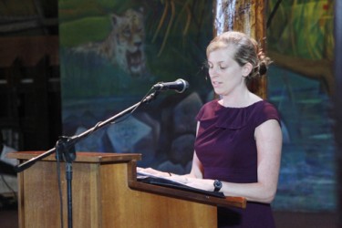 US Embassy Public Affairs Officer Tabatha Fairclough telling a story from the US on World Storytelling Day at the Umana Yana (Photo by Arian Browne)