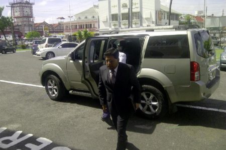 Minister of Finance Dr Ashni Singh arriving fashionably late for his seventh budget presentation yesterday