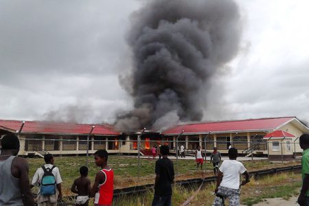 Fire raging at the Parfait Harmonie Primary School yesterday.
