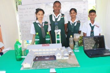 West Demerara Secondary students pose with their project’ Aqua Grant’