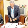 Chief Executive Officer of e- Learning Jamaica Ltd Avrill Crawford shares a light moment with Peter Williams of Nelson Thornes. Occasion was last Thursday’s signing of a contract to provide the e-textbook Geography for CSEC at the offices of e- LJam. At centre is Robert Philips, education specialist at e-LJam. (Jamaica Observer photo)