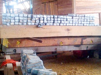 Some of the parcels of cocaine that were found in hollowed out timber logs which were being prepared for shipment to The Netherlands. They indicate meticulous preparation.