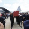 The coffin of Inspector Zulkifli Mamat of the Malaysian Police 69th Commando Battalion, who was killed on Friday in the standoff between Malaysian security forces and armed followers of the Sultanate of Sulu, is carried after its arrival at an airport in Subang, outside Kuala Lumpur March 2, 2013. A standoff between Malaysian security forces and armed Filipinos ended in violence on Friday, with at least two police officers killed amid conflicting reports of casualties as Malaysian Prime Minister Najib Razak declared his patience had run out. Malaysian state news agency Bernama said that two police commandos had been killed in a mortar attack and two wounded after security forces tried to force out the group of at least 100 Filipinos who have been holed up in eastern Sabah state for more than two weeks.
REUTERS/Bazuki Muhammad