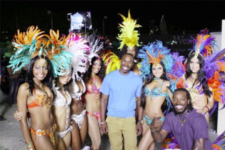 Caribbean Premier League Franchise players bask among some of the Carnival girls. (Photo courtesy of CPL website)