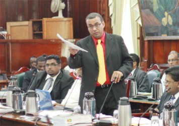 Natural Resources Minister Robert Persaud speaking in Parliament yesterday 
