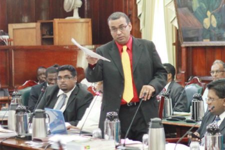 Natural Resources Minister Robert Persaud speaking in Parliament yesterday
