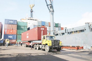 Containers being moved from Port Georgetown