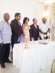 Proprietors of the Millennium Manor Hotel, Yonette and Lancelot Bacchus (third and fourth from left respectively) flanked by Bobby Vieira (left), Minister of Tourism Irfaan Ali (second from left) and Minister of Public Works Robeson Benn at the opening last night.