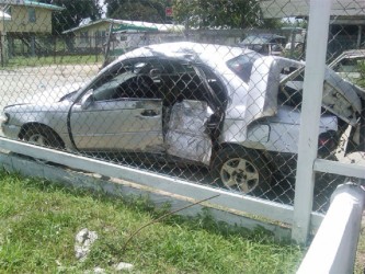 The wreckage of the Toyota Corolla car in which Denzil Thomas and Quincy David sustained fatal injuries. The car was later impounded at the Grove Police Station 