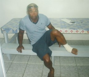 Wilton Tafares says his foot was injured when he was beaten by a policeman at Imbamadai