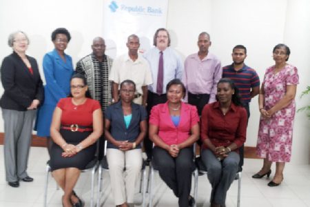 Some members of the 2013 panel pose with Managing Director at Republic Bank (Guyana) Limited, John Alves (fourth from right in back row) and other bank employees.